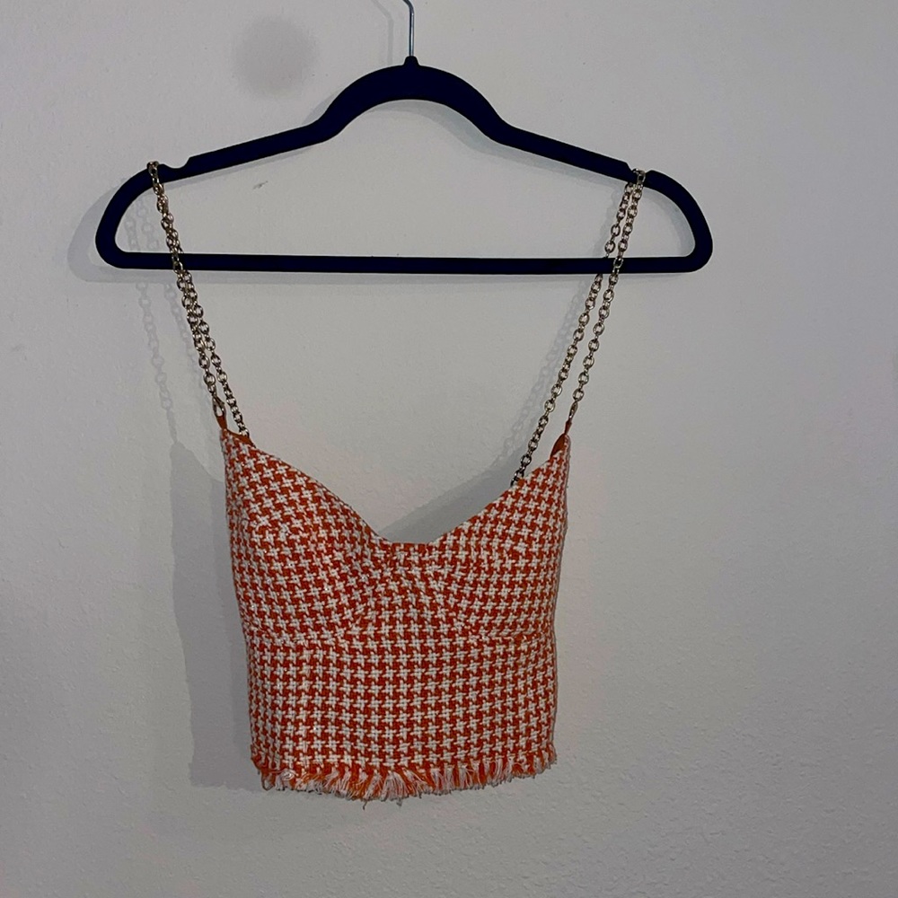 Cider orange tweed checkered blouse with gold chain straps.